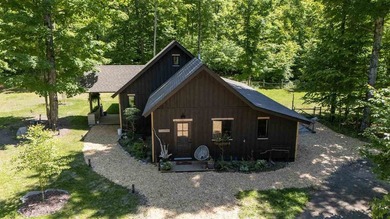 Nestled on 5 picturesque acres along the iconic Tunnel of Trees - photo 1