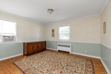 Welcome to this charming expanded 4-bedroom, 2-bath Cape nestled - photo 12