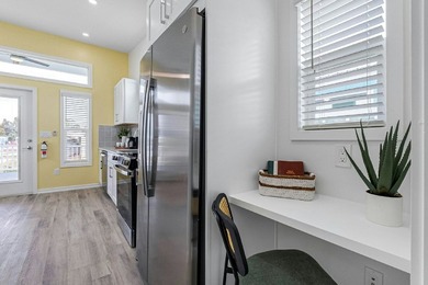 This NEW 2025 1 Bedroom, 1 Bath; Resort Cottage Home features a - photo 12