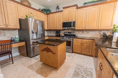 Luxury lakefront living awaits in Magnolia Lakes! This - photo 12