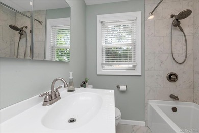 Welcome to this charming expanded 4-bedroom, 2-bath Cape nestled - photo 14