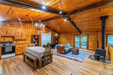 True Ozark living in a real log home that comes with a boat slip - photo 15