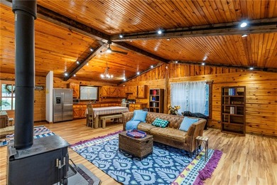 True Ozark living in a real log home that comes with a boat slip - photo 16