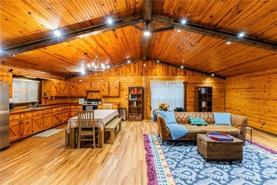 True Ozark living in a real log home that comes with a boat slip - photo 20