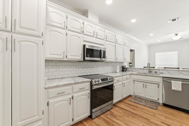 Welcome to this picture-perfect, corner lot brick beauty, in the - photo 21