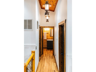 True Ozark living in a real log home that comes with a boat slip - photo 22