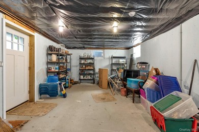Welcome to this charming expanded 4-bedroom, 2-bath Cape nestled - photo 23