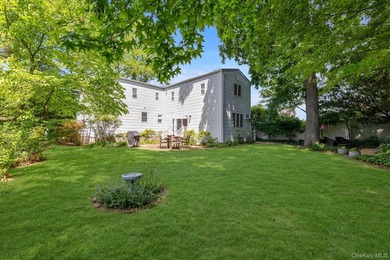 Welcome to this charming expanded 4-bedroom, 2-bath Cape nestled - photo 24