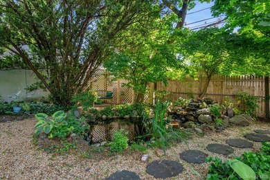 Welcome to this charming expanded 4-bedroom, 2-bath Cape nestled - photo 26