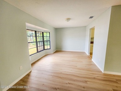 Welcome to this updated 3-bedroom, 2-bath home in Northwest Palm - photo 9