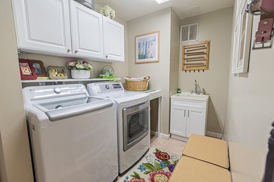 Luxury lakefront living awaits in Magnolia Lakes! This - photo 35
