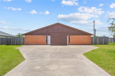 Opportunity awaits! You'll find this quaint duplex nestled away - photo 2