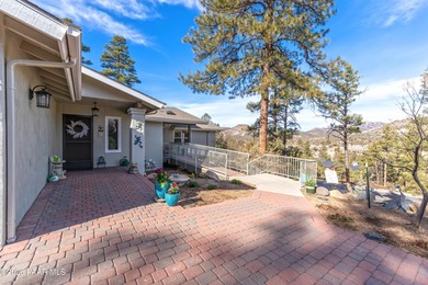 Welcome to this beautifully remodeled Prescott estate on over 2