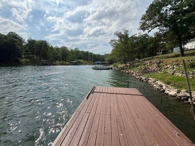 Tucked away in a peaceful cove on beautiful Crown Lake, this - photo 8