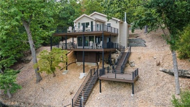 Lake Home ActiveUnderContr in Sunrise Beach, Missouri