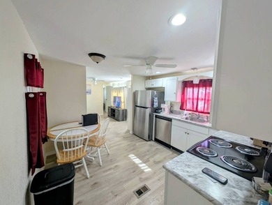 Experience the pinnacle of carefree Florida living in this - photo 5