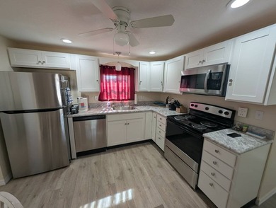 Experience the pinnacle of carefree Florida living in this - photo 7