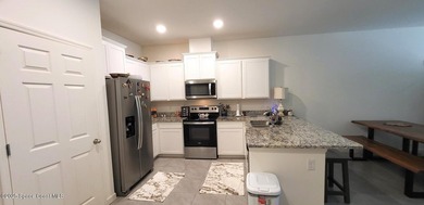 Live in luxury here at The Cove at Morrow Place in Indian River - photo 7