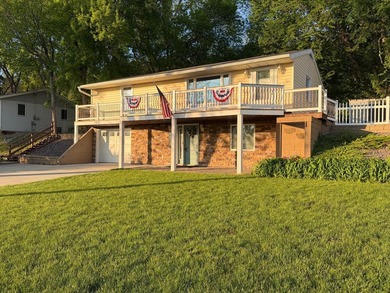 This three-bedroom, two-bathroom home sits across the bay from - photo 1