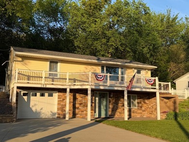 This three-bedroom, two-bathroom home sits across the bay from - photo 2