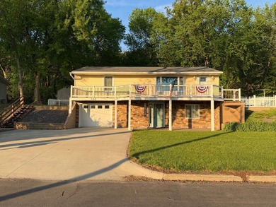 This three-bedroom, two-bathroom home sits across the bay from - photo 3