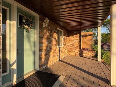 This three-bedroom, two-bathroom home sits across the bay from - photo 4