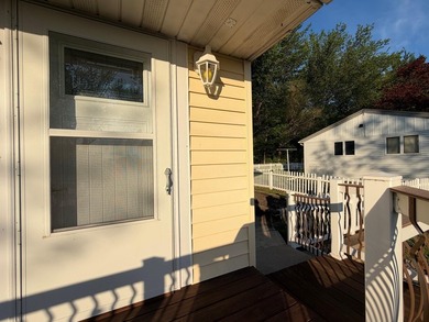 This three-bedroom, two-bathroom home sits across the bay from - photo 9