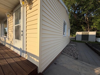 This three-bedroom, two-bathroom home sits across the bay from - photo 10