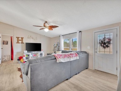 Enjoy lake view living on this rare 1.49-acre turnkey property - photo 11