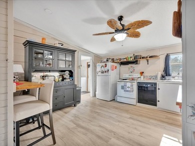 Enjoy lake view living on this rare 1.49-acre turnkey property - photo 12