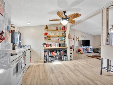 Enjoy lake view living on this rare 1.49-acre turnkey property - photo 14