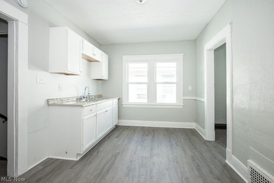 The large fully rehabbed duplex is waiting for you today - photo 27