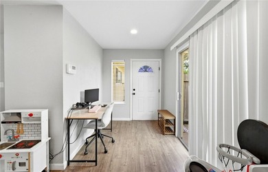Desirable Lakewood Village featuring laminate and tile flooring - photo 3