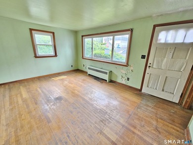 Cape cod style home with newer roof, vinyl siding. Located in a - photo 3