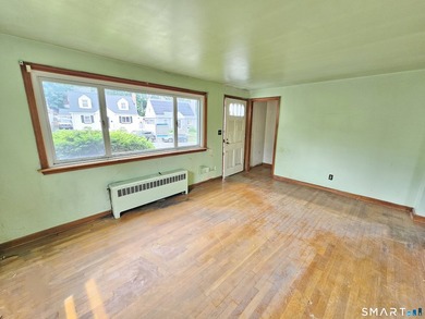Cape cod style home with newer roof, vinyl siding. Located in a - photo 4