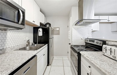 Desirable Lakewood Village featuring laminate and tile flooring - photo 6
