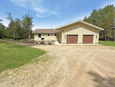 (private lake, pond, creek) Home For Sale in Powers Michigan