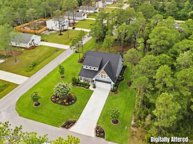 The Coquina by Elan Homes features a spacious and inviting - photo 4