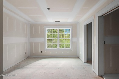 The Coquina by Elan Homes features a spacious and inviting - photo 8