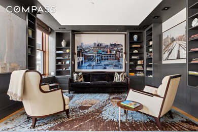 This exquisite triple-mint residence enjoys a semi-private - photo 5