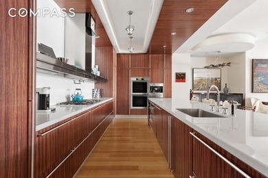 This exquisite triple-mint residence enjoys a semi-private - photo 7