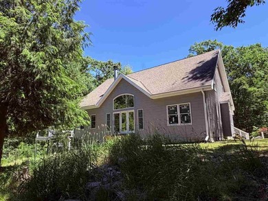 Resort Township home on a private 2.69-acre wooded parcel with - photo 4