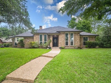 Charming ranch on corner lot in North Dallas with a versatile