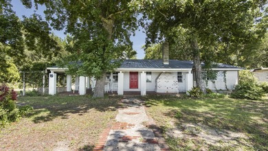Incredible opportunity across from the Choctawhatchee Bay! This - photo 3