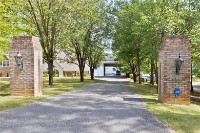Embrace the beauty of lakeside living in this magnificent home - photo 2