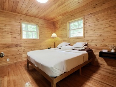 Fantastic log-sided year-round cottage tucked away on 24 private - photo 18