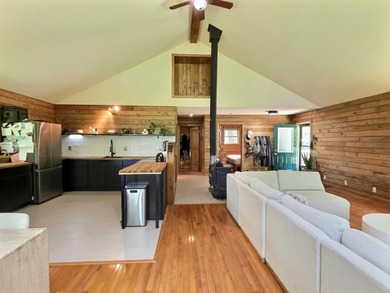 Fantastic log-sided year-round cottage tucked away on 24 private - photo 26