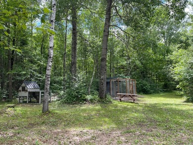 Fantastic log-sided year-round cottage tucked away on 24 private - photo 35