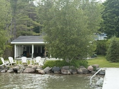 Located on Walloon Lakes' West arm, this property offers - photo 1