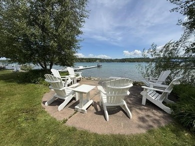 Located on Walloon Lakes' West arm, this property offers - photo 3